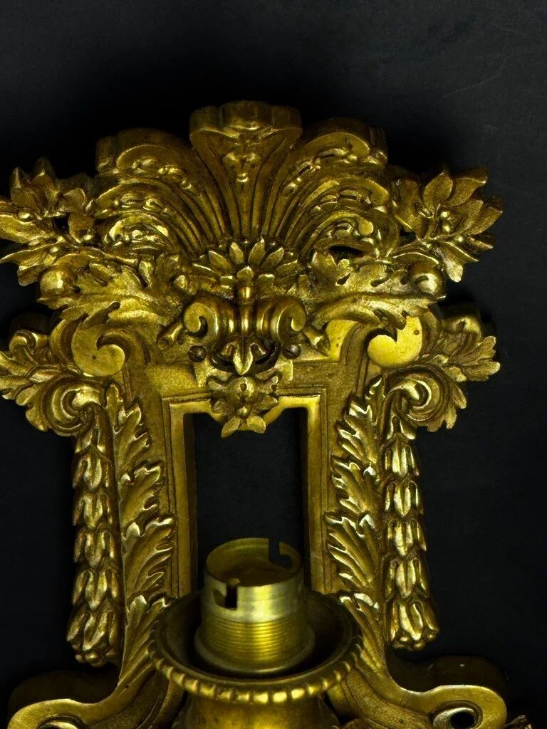 A pair of important gilt bronze wall sconces, Louis XVI style, 19th century.