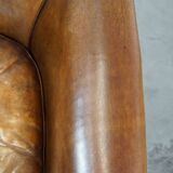 Club chair made of sheepskin leather with the most beautiful colors and a stunning patina