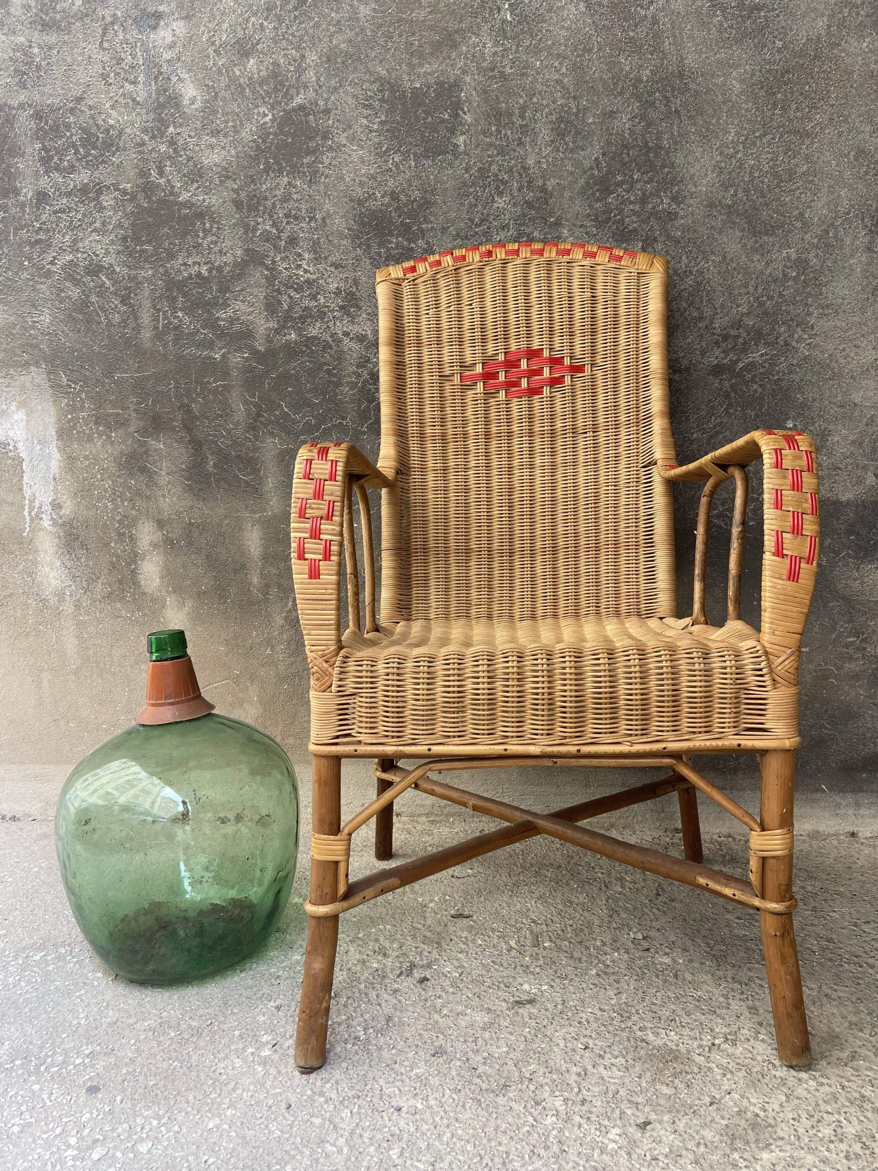 Vintage braided rattan armchair