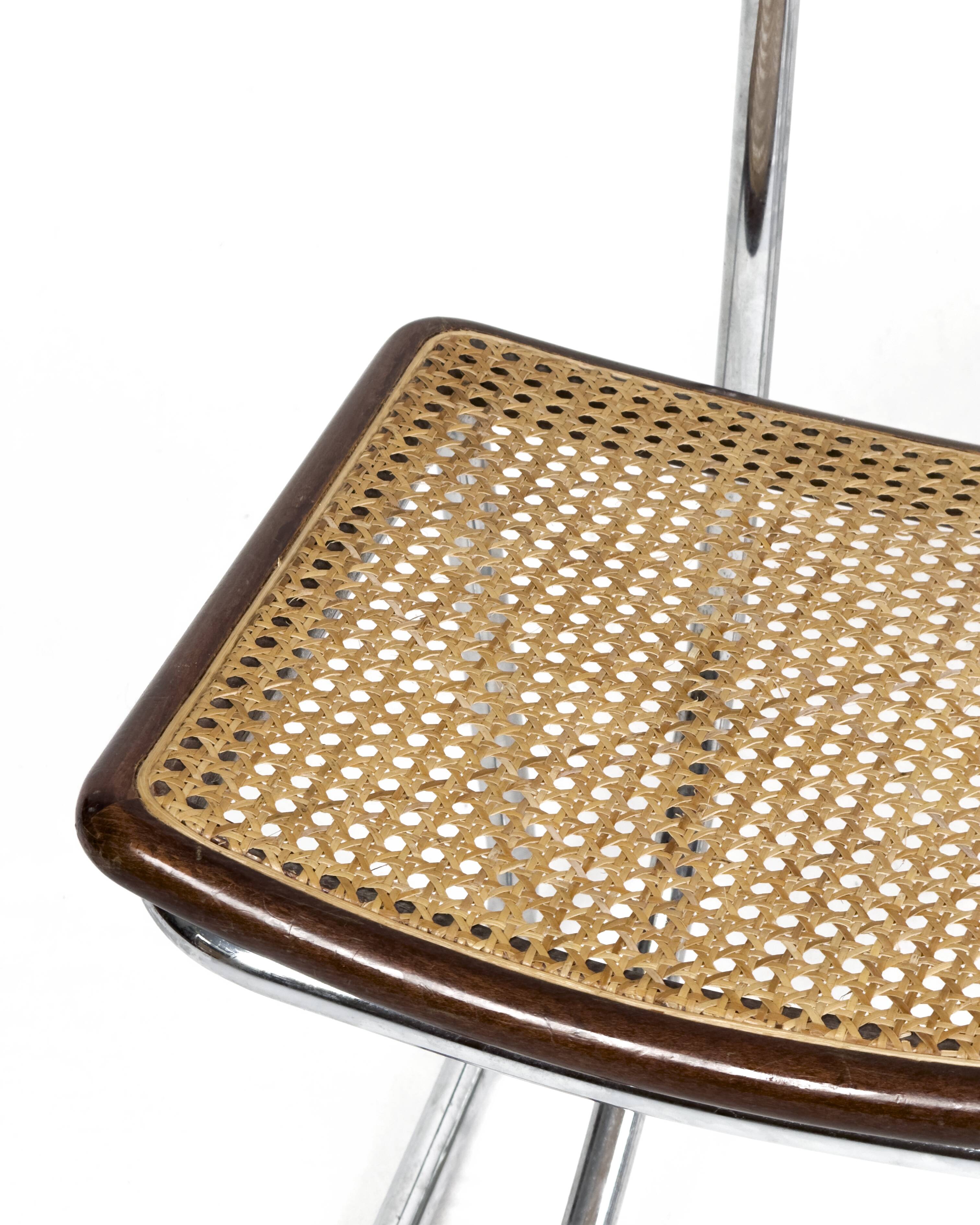 Ensemble de 4 chaises vintage à accoudoirs en chrome, bois et paille de Vienne, années 1970.