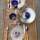 8 vintage blown glass plates with swirl decoration