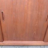 Low sideboard with 3 sliding doors in teak. Denmark 1960