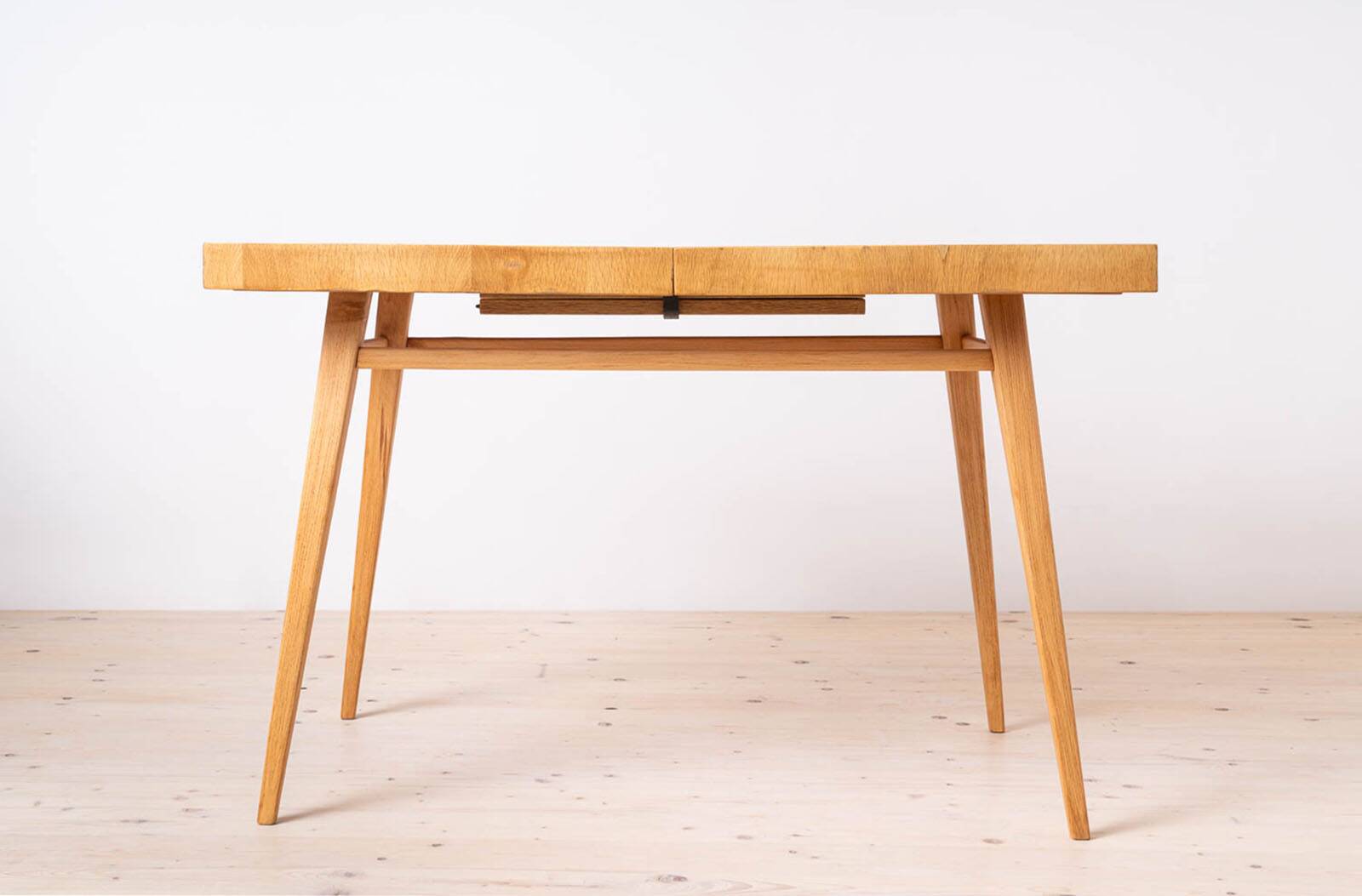 Dining table and 4 chairs by Antonin Šuman, restored.