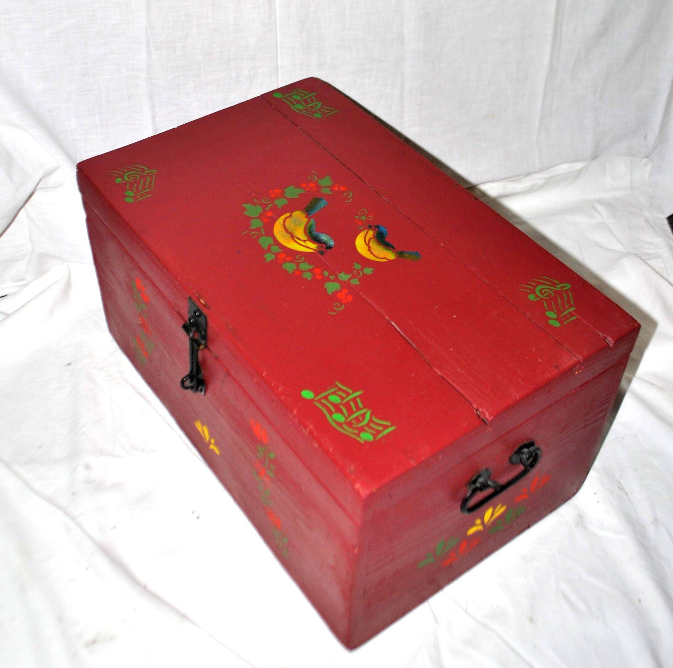 Vintage wooden trunk – toy chest or music box with painted stencil bird decoration.