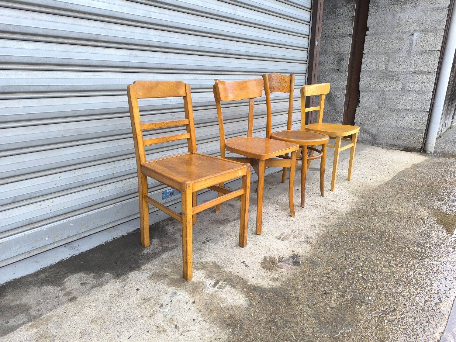 Set of four mismatched bistro chairs