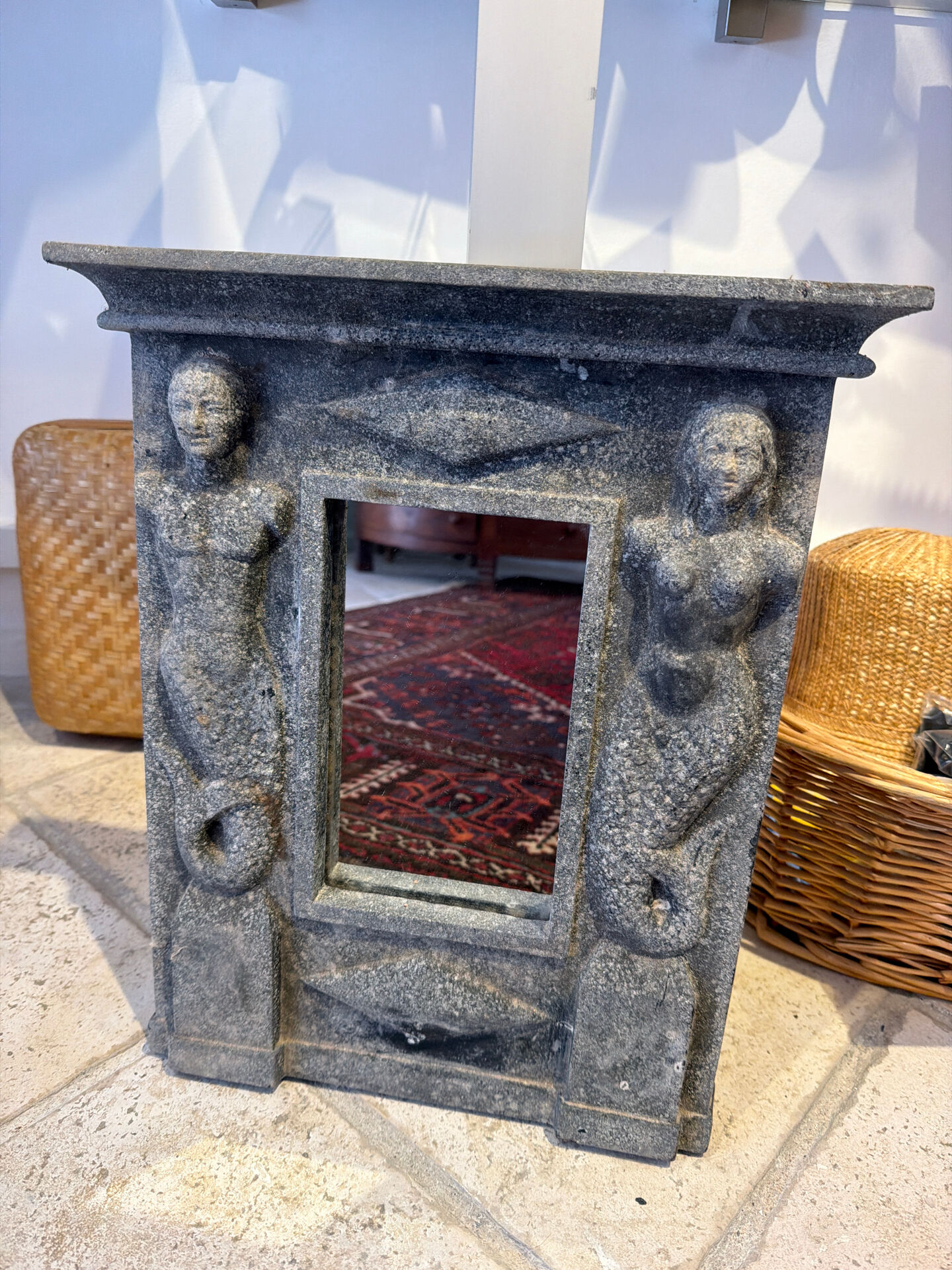 Antique mirror in sculpted slate with caryatids – 19th century
