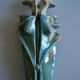 Surreal ceramic sculpture in relief signed to be identified.
