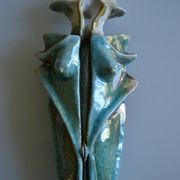 Surreal ceramic sculpture in relief signed to be identified.
