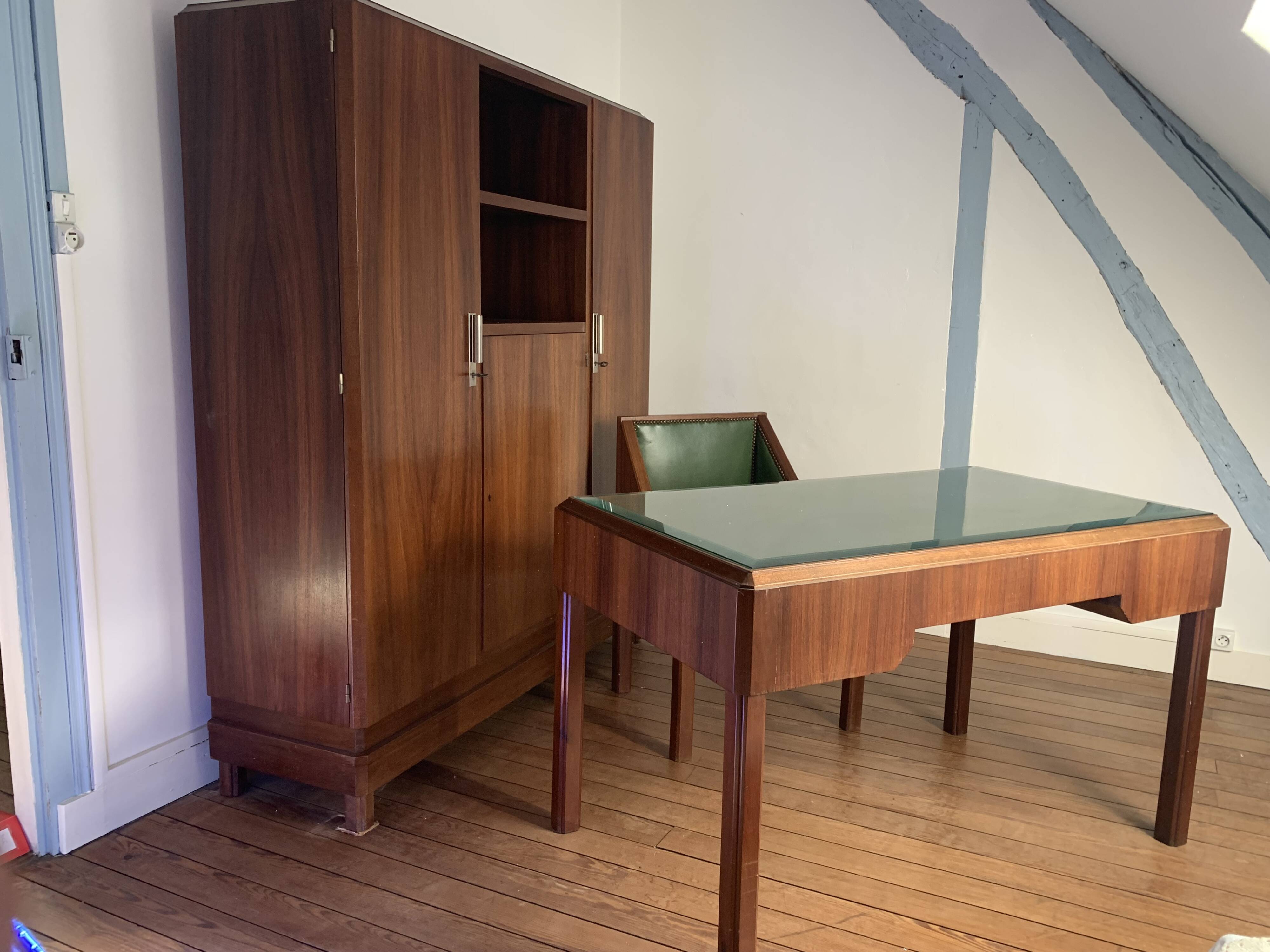 Rosewood desk, armchair and bookshelf.