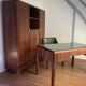 Rosewood desk, armchair and bookshelf.