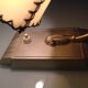 Brass bedside lamp and beige lampshade art deco style
