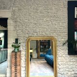 Antique mirror 136.5/98cm Louis-Philippe pearl-gilded with gold leaf.