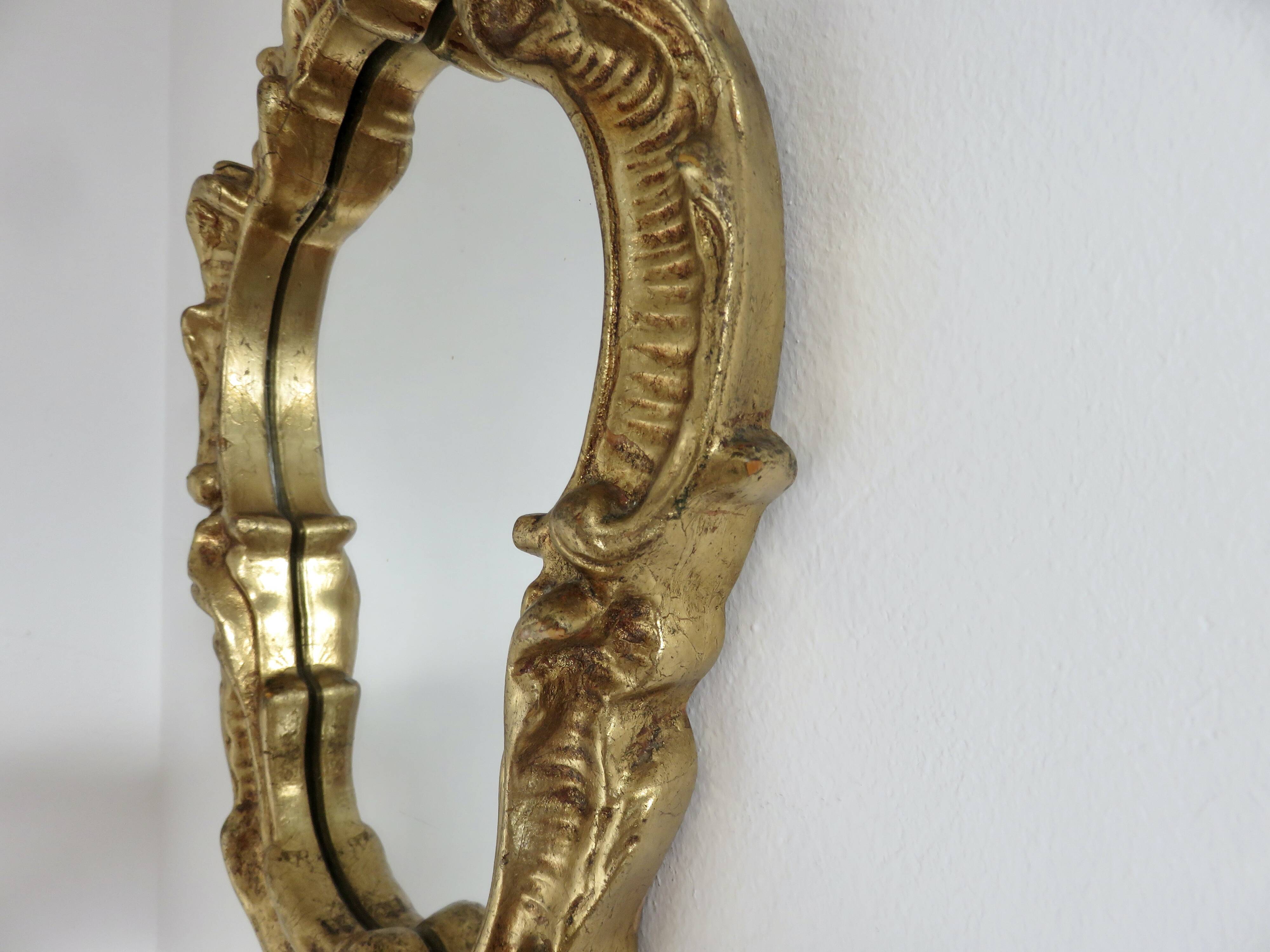 Miroir mural style baroque, en résine dorée, 1960/70