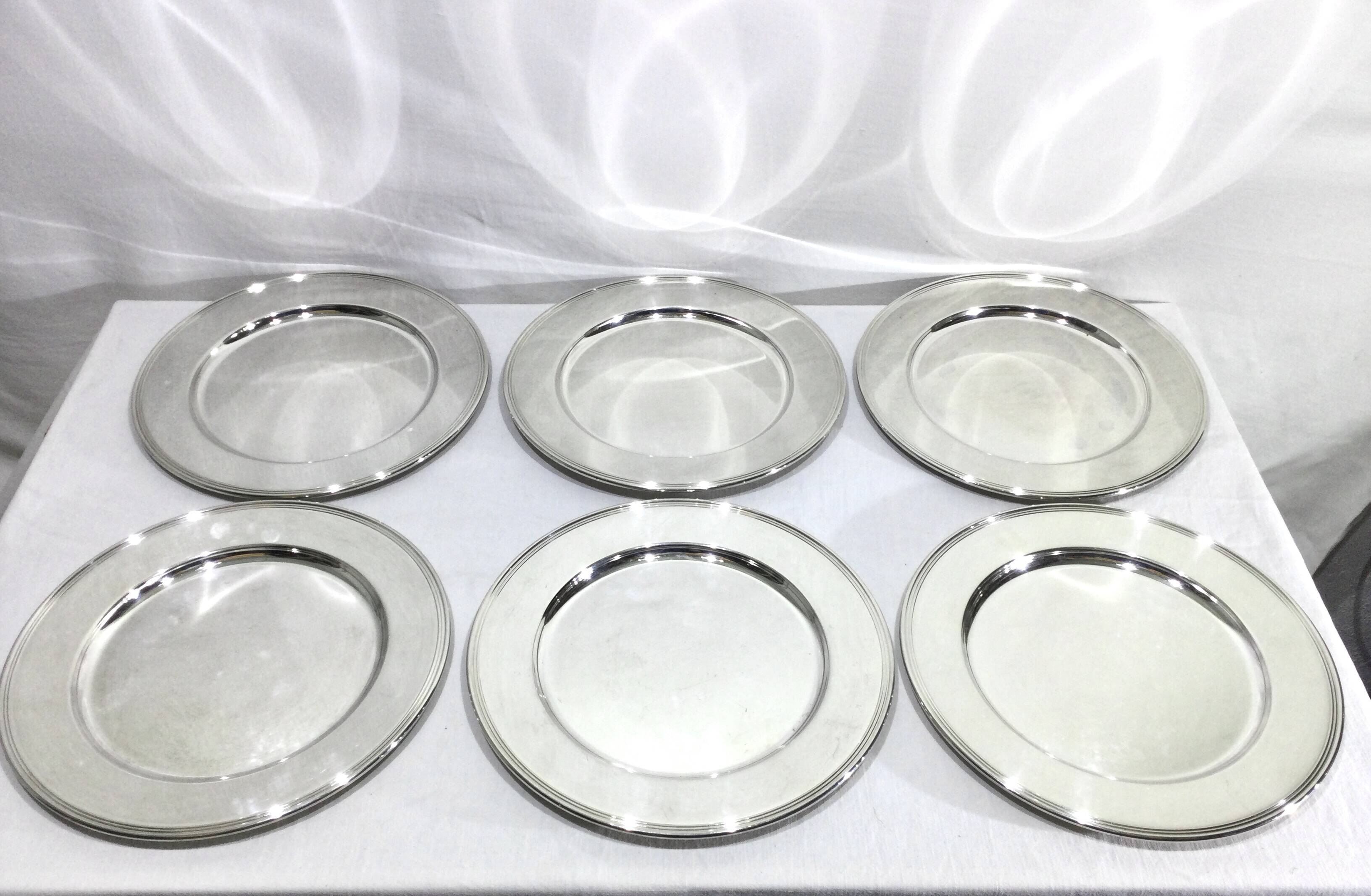 Set of silver-plated serving dishes and bells