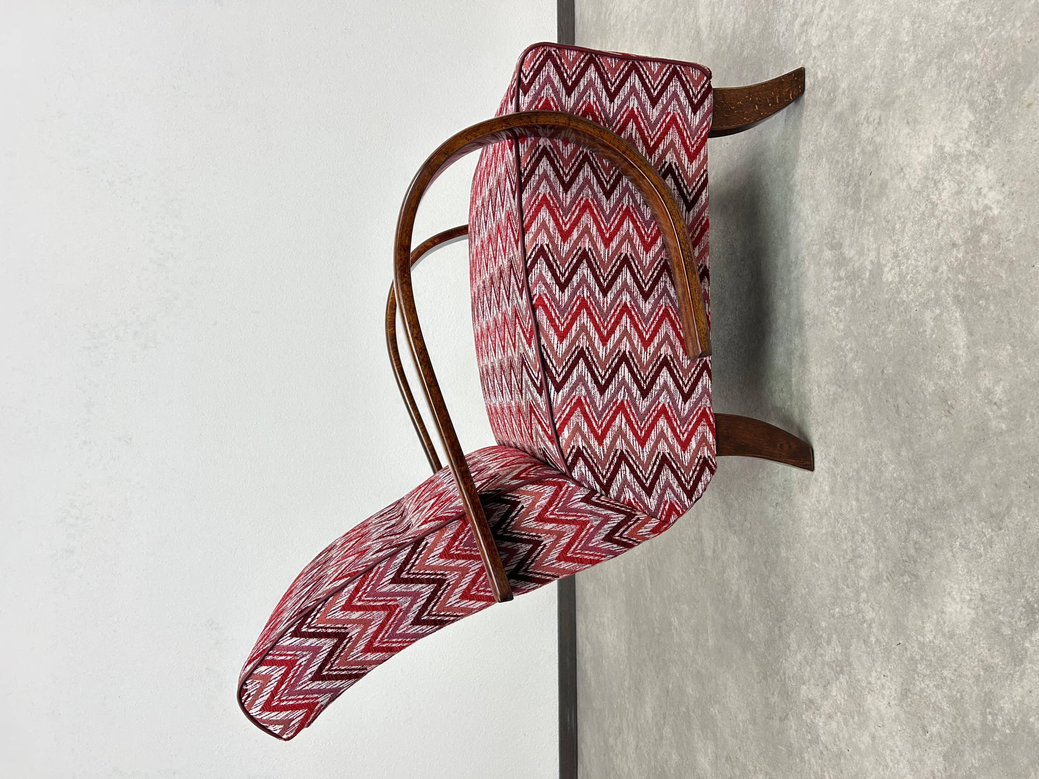 C-shaped lounge chair by J. Halabala