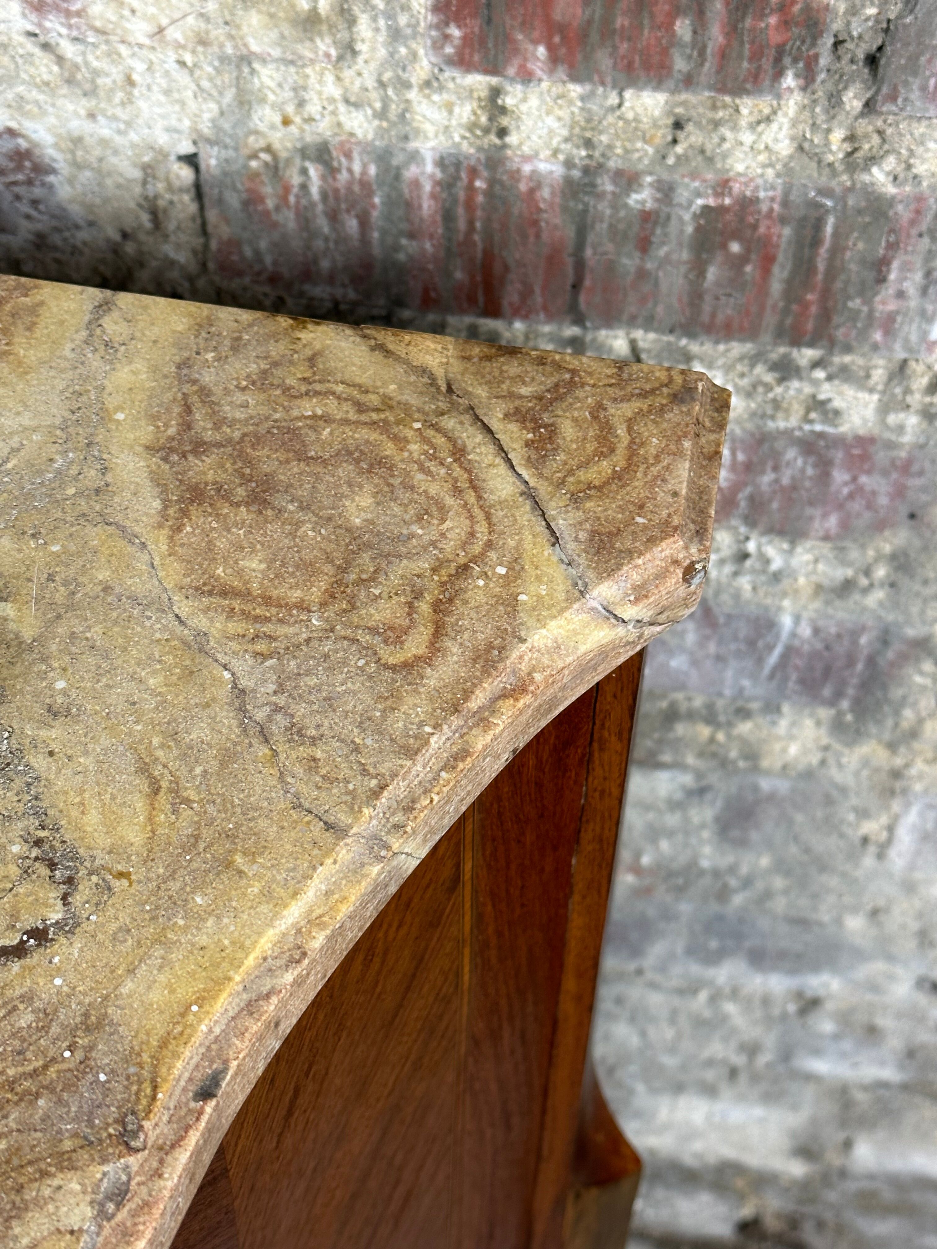 Louis XV/XVI transition style curved chest of drawers in marquetry and bronze