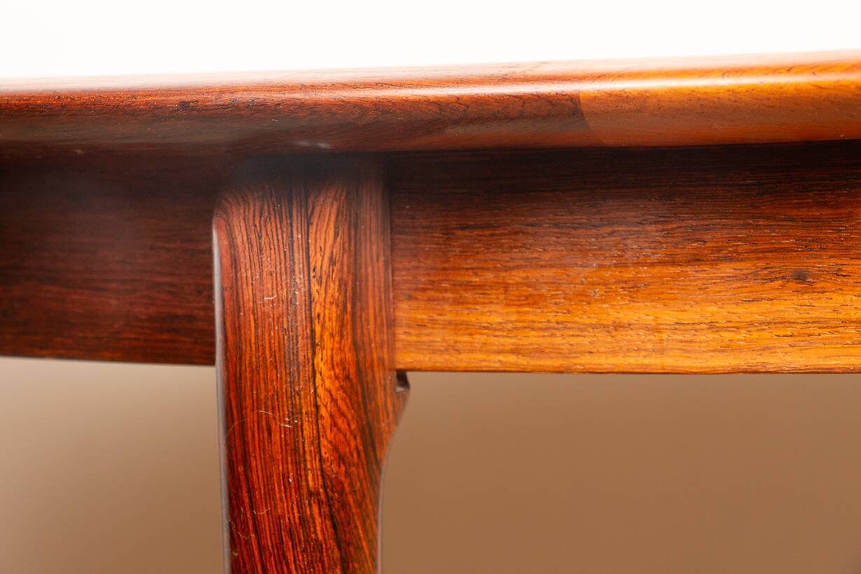 Danish extendable dining table in rosewood by Kai Lyngfeldt Larsen.