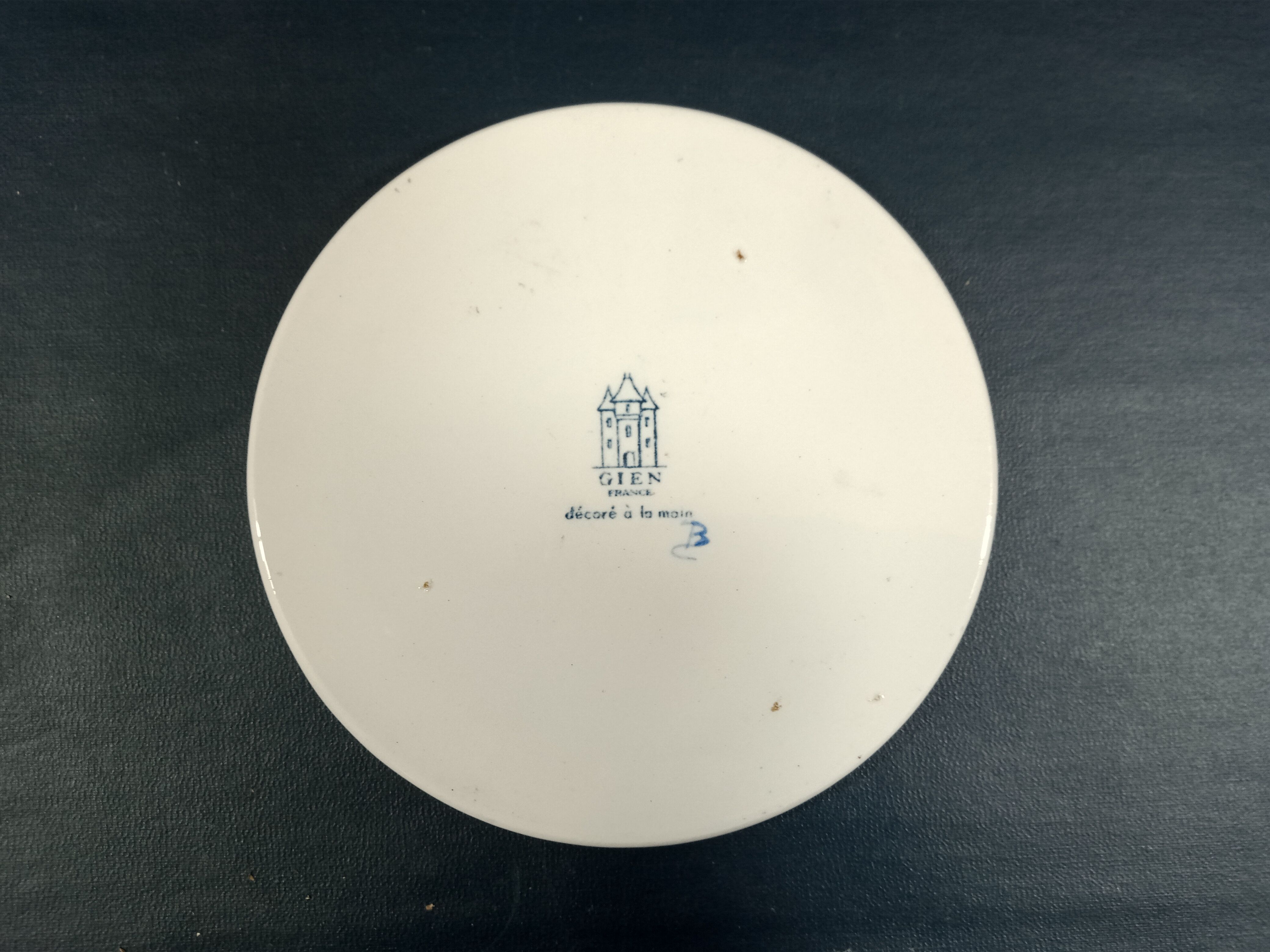 Underneath earthenware bottles of GIEN model "Kashmir"