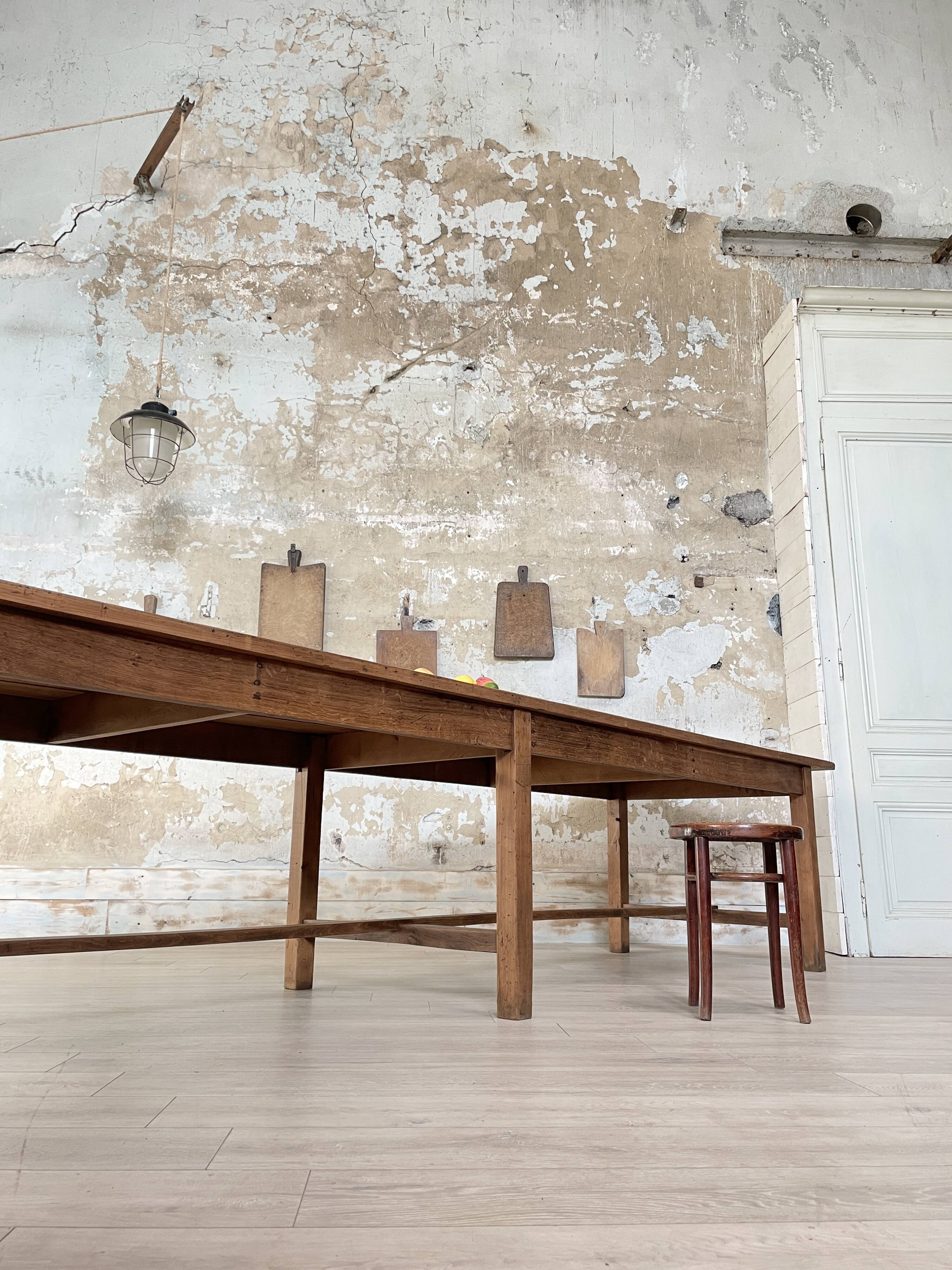 Solid wood workshop table with straight legs.