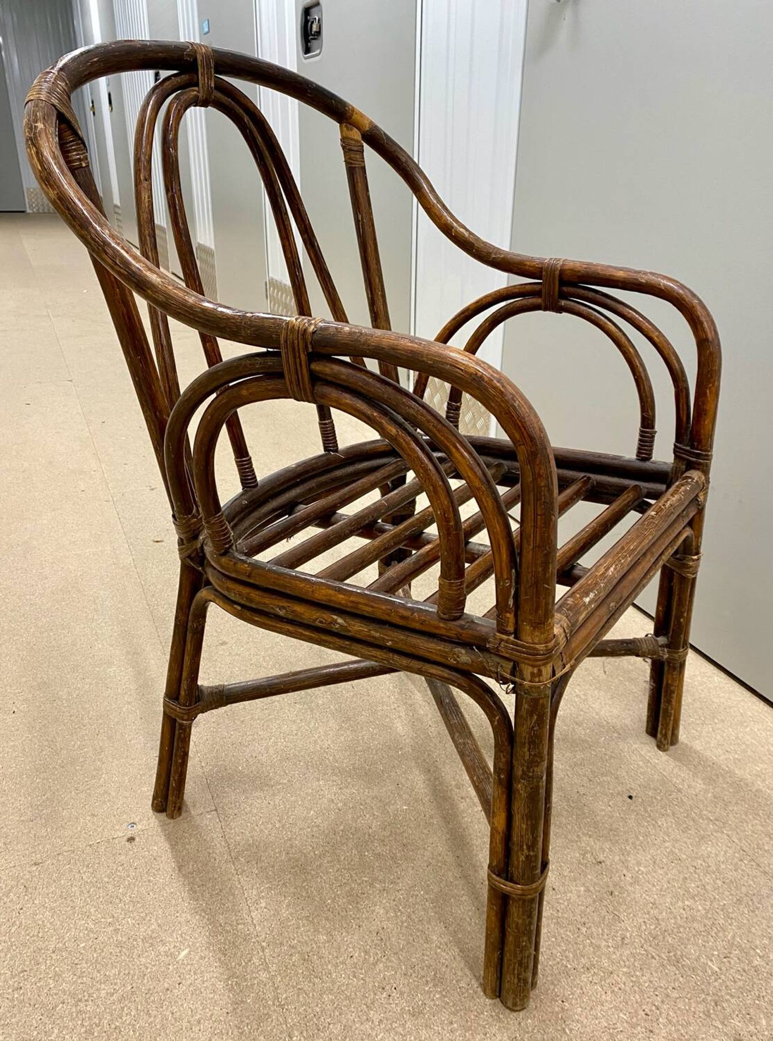 Vintage rattan armchair (1960s)