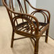 Vintage rattan armchair (1960s)