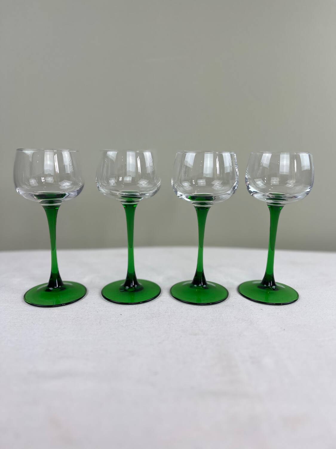 Green stemmed glasses
