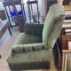 Set of two green velvet toad armchairs with fringe
