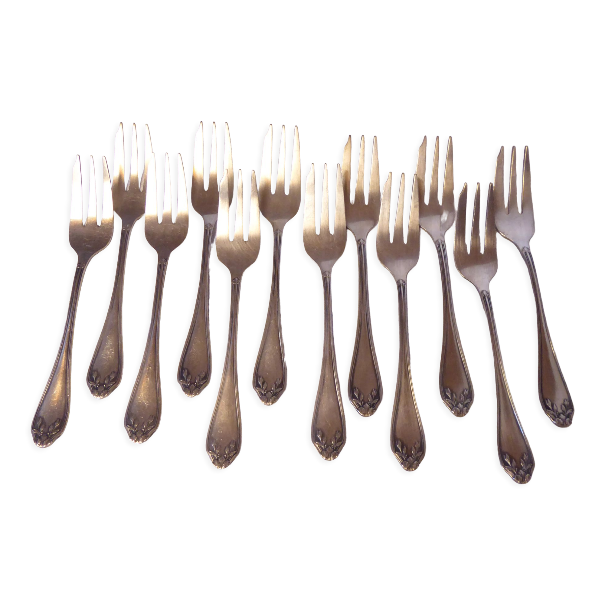 12 fourchettes à dessert en métal argenté
