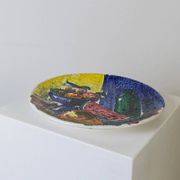 Multicolored hand-painted ceramic wall plate with 1960s Italian fruit motif, signed Stile