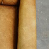 Unique children’s armchair made of cowhide leather in Art Deco style, featuring a light cognac color
