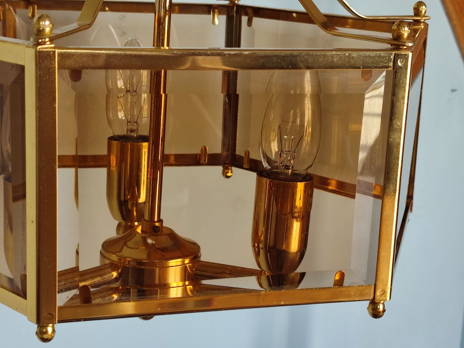 Brass pendant lamp and five-faceted vintage smoked glasses