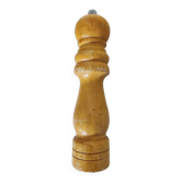 Turned wooden pepper mill