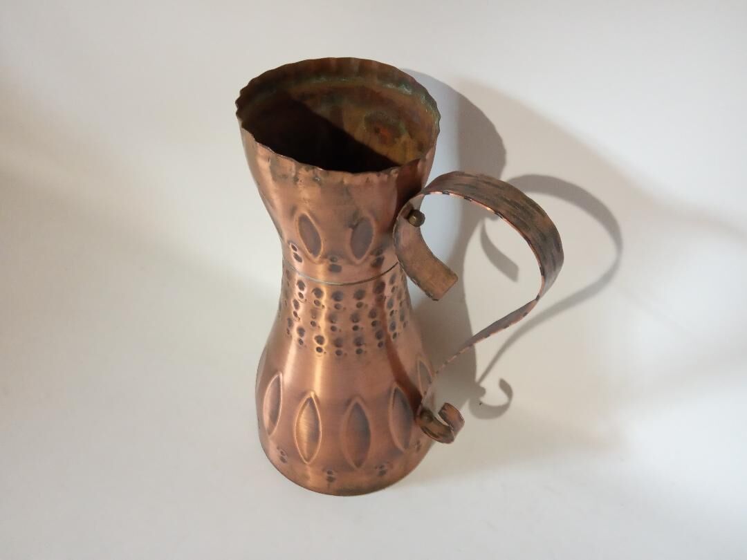 Copper vase with sean