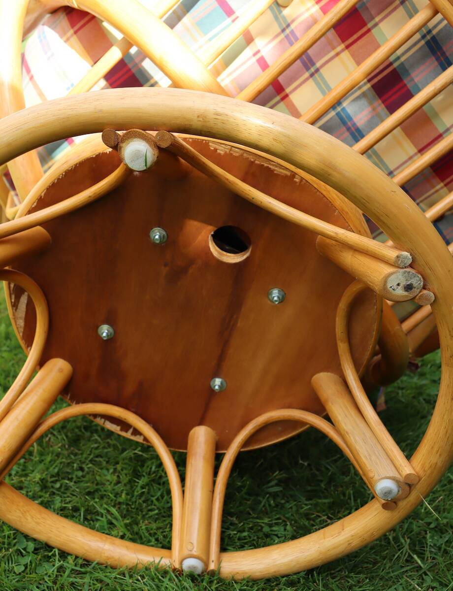 Swivel rattan armchair with matching ottoman