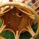 Swivel rattan armchair with matching ottoman