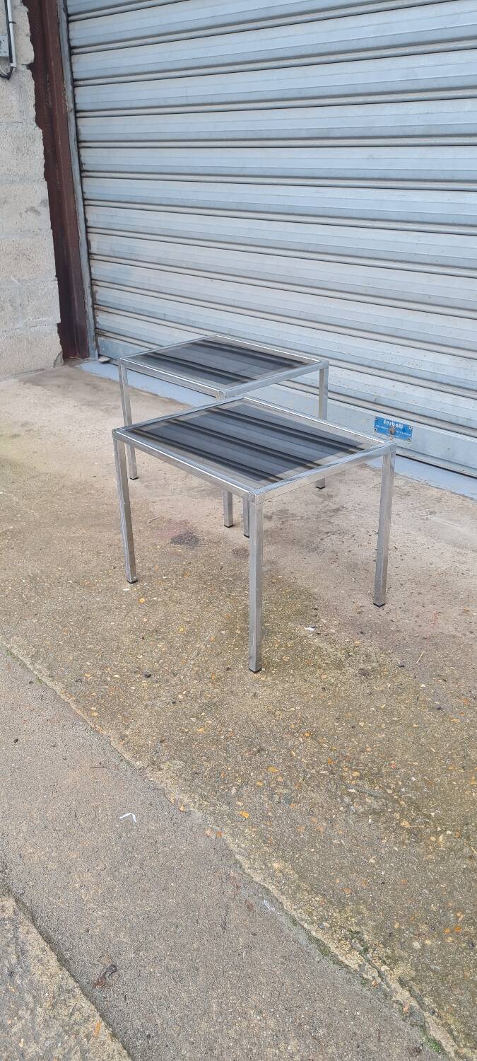 Pair of side tables in chrome metal and glass