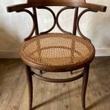 Cane and curved wood armchair