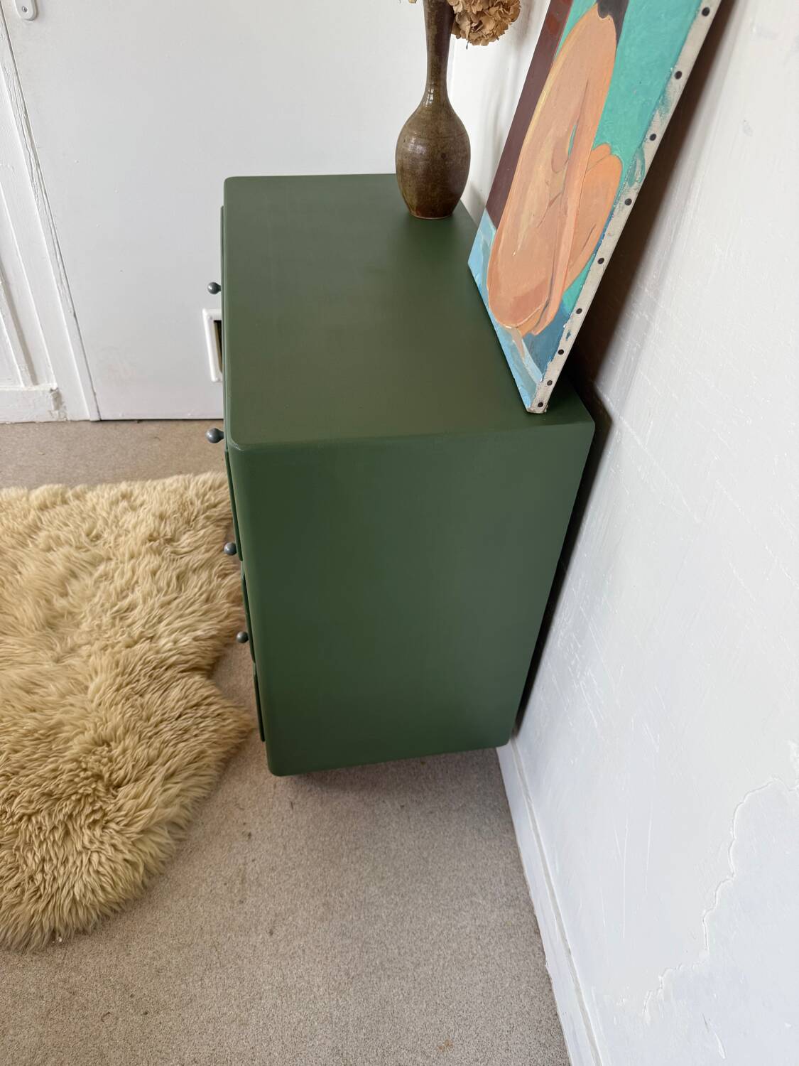 Vintage olive green chest of drawers with striped base