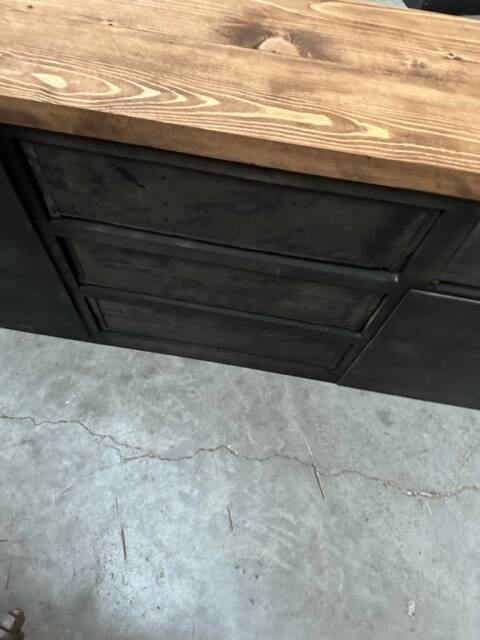 Old piece of furniture transformed into a TV stand