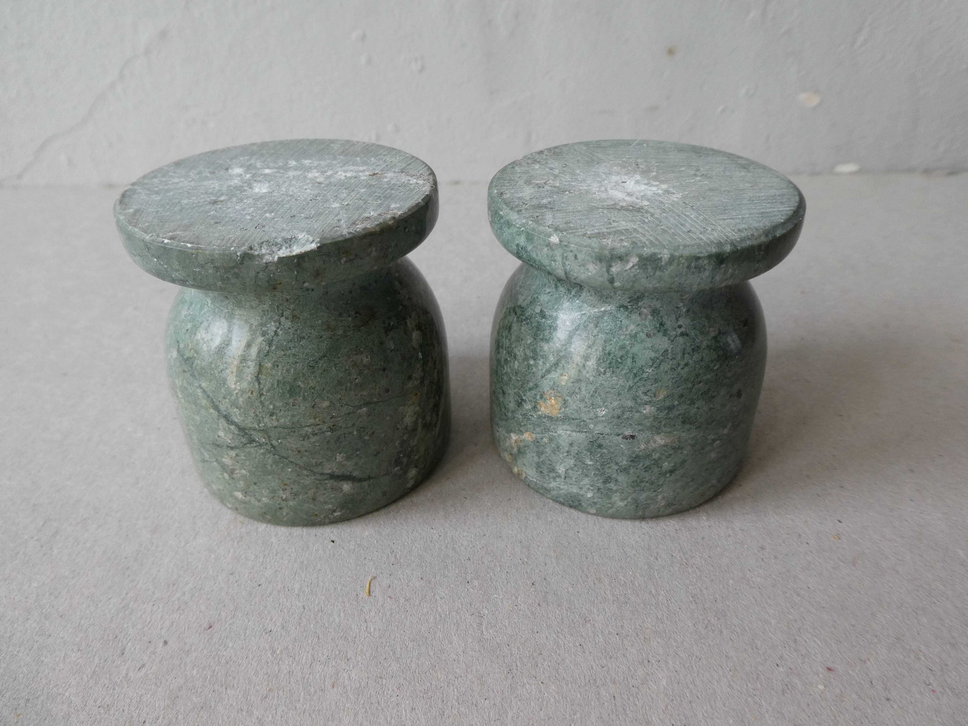 Pair of green marble cockroaches