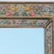 Mirror with flower decoration