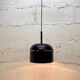 Black pendant lamp designed by Arnold Berges for Staff Leuchten, 1970.