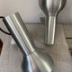Pair of brushed metal wall sconces