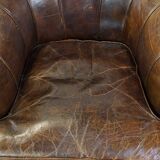 Stylish armchair made of cowhide leather with a unique design and beautiful finish
