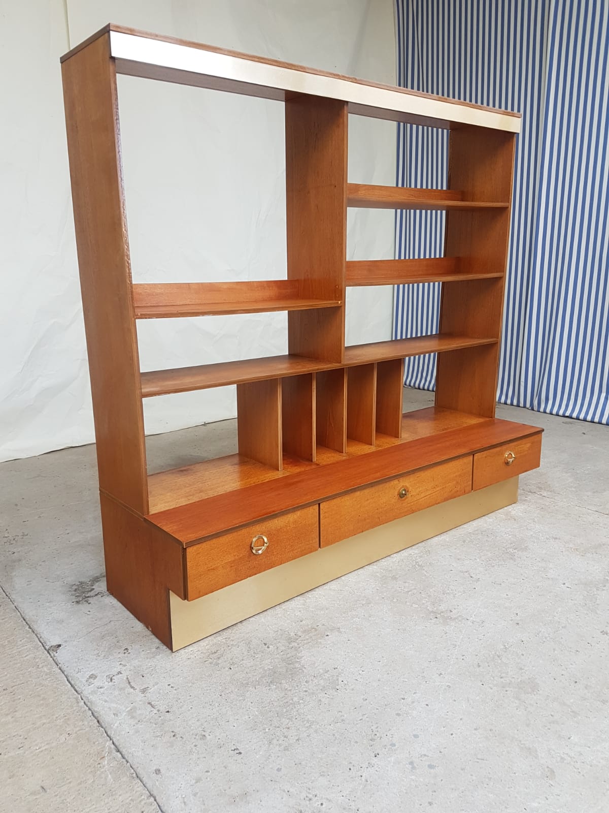 Vintage mid century library in teak used as wall unit shelf, room divider, media store