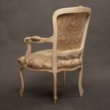 Pair of Louis XV style armchairs – Carved, gilded wood and brocade fabric