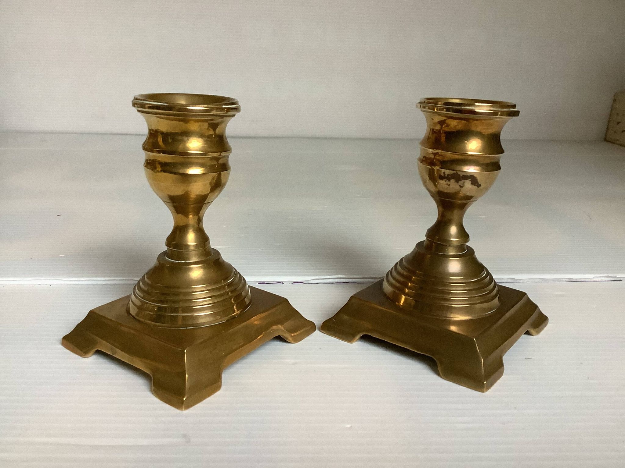 Pair of small brass candle holders