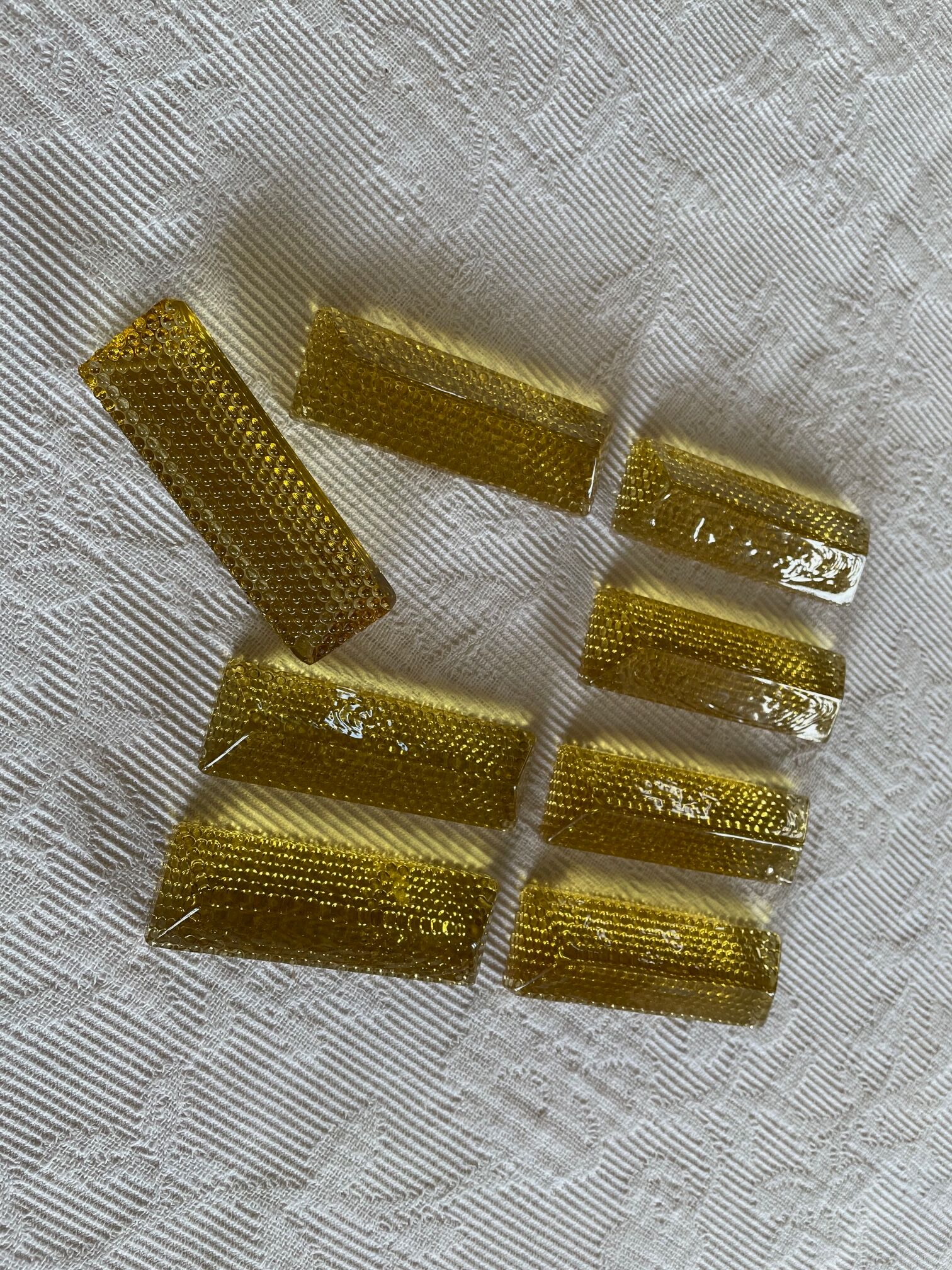 Set of tinted glass knife rests