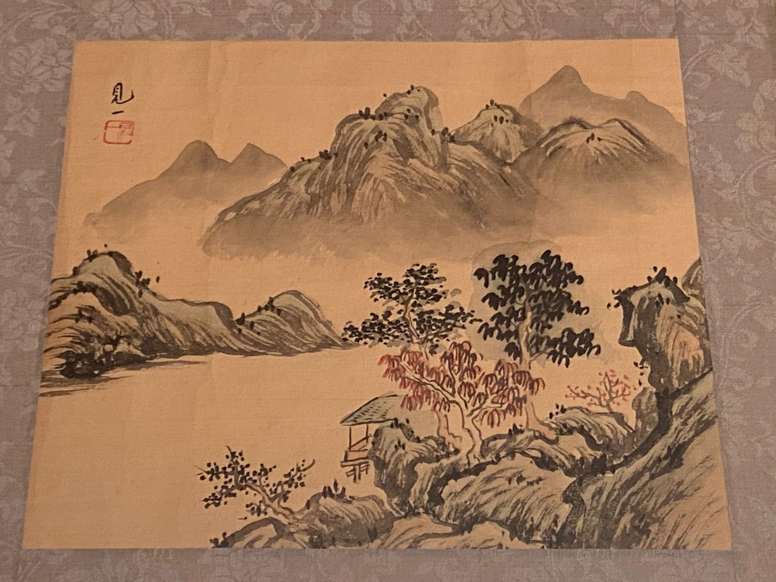 India ink drawing with red markings depicting a mountain landscape