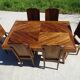 Antique solid walnut table with marquetry and extensions.